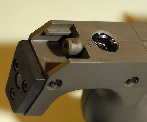 PS90 P90 internal laser details showing switch and housing.