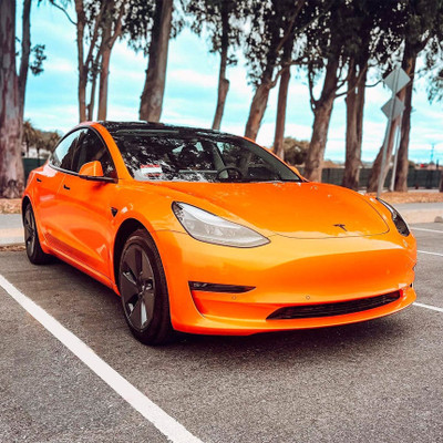 Deep Orange Vinyl Wrap On Car