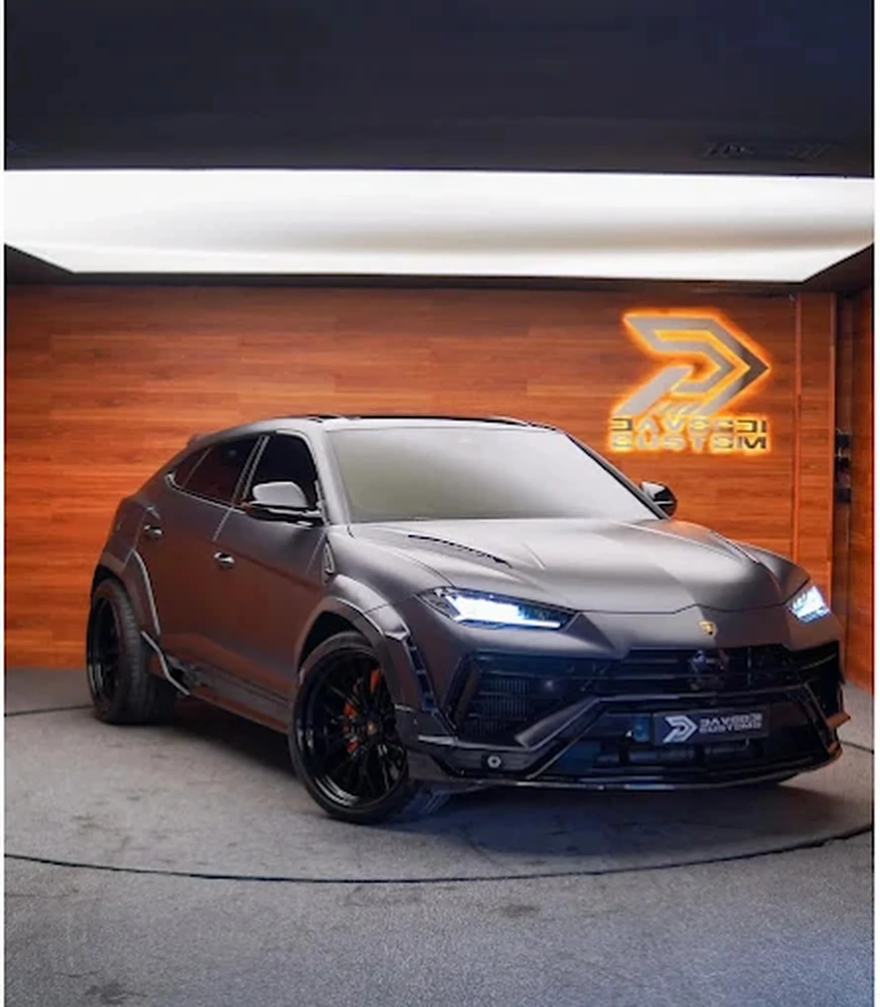 Blue chrome wrapped Lamborghini Urus at Davoodi Customs workshop