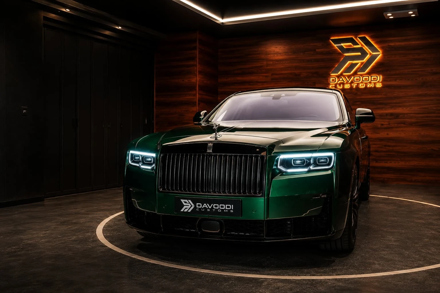 Luxury vehicle wrapping showroom at Davoodi Customs Al Quoz Dubai — wrapped Rolls-Royce and BMW