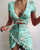 Rejea Floral Print Fashion Tie Up Wrap Mini Dress Summer Holiday Ruffles Sundress Ruched Women's Dress Short Sleeve
