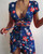 Rejea Floral Print Fashion Tie Up Wrap Mini Dress Summer Holiday Ruffles Sundress Ruched Women's Dress Short Sleeve