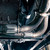 2025+ RAM 1500 Downpipe installed under vehicle showing detail of flex joints.