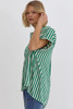 Picture of woman wearing and emerald green short sleeve striped button-up blouse