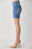 Picture of woman wearing 5 button stretch shorts