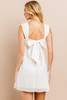 Picture of girl wearing a white graduation dress