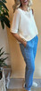 Picture of a woman wearing light blue Tencel jogger pants