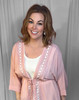 Picture of woman wearing boho crochet blush robe