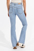 Picture of woman wearing lightwash bootcut flare jeans by Molly Bracken