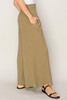 Picture of woman wearing wide leg olive gauze pants