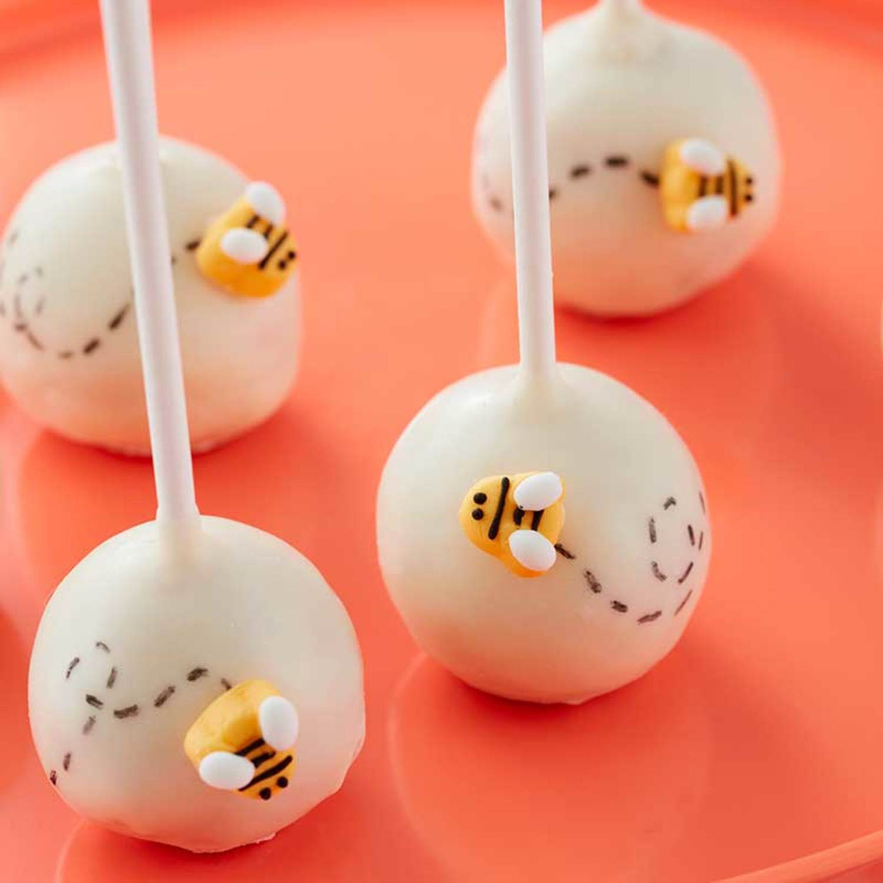 Donut Hole Cake Pops - Amanda's Cookin' - Cake & Cupcakes