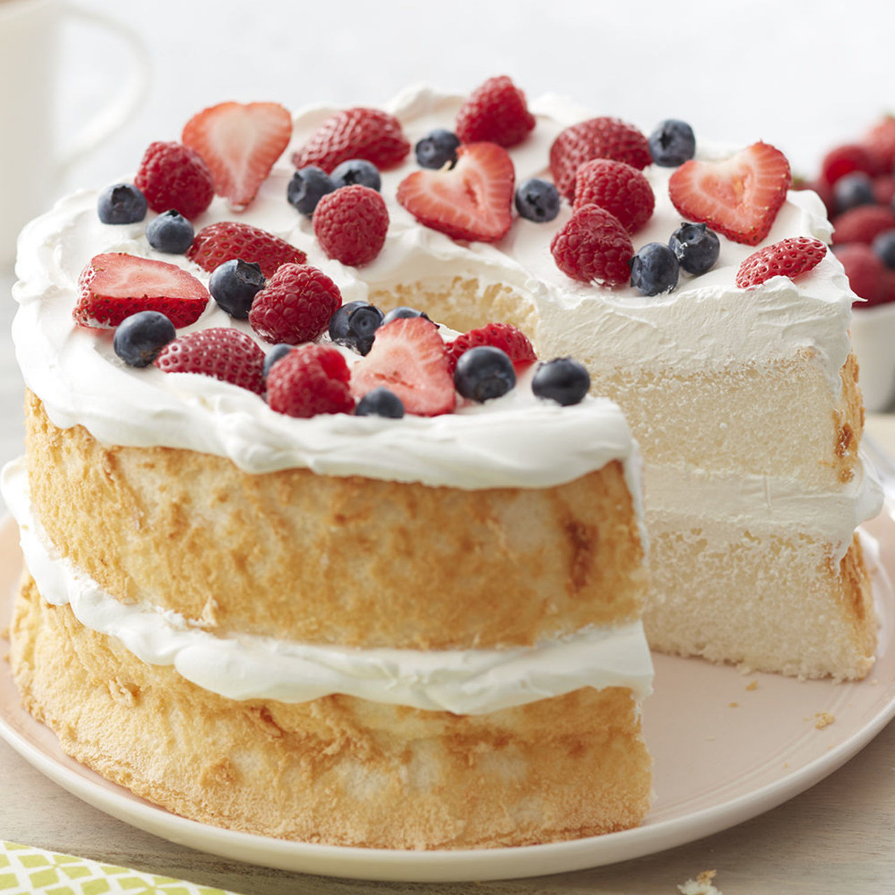 Angel Food Cake with Berries and Whipped Cream Wilton