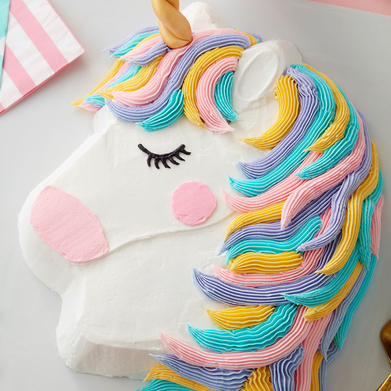 Unicorn With Rainbow Horn Cake