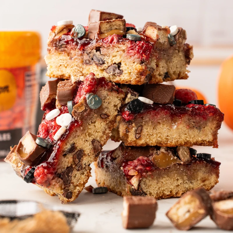 Halloween Raspberry Chocolate Caramel Cookie Bars