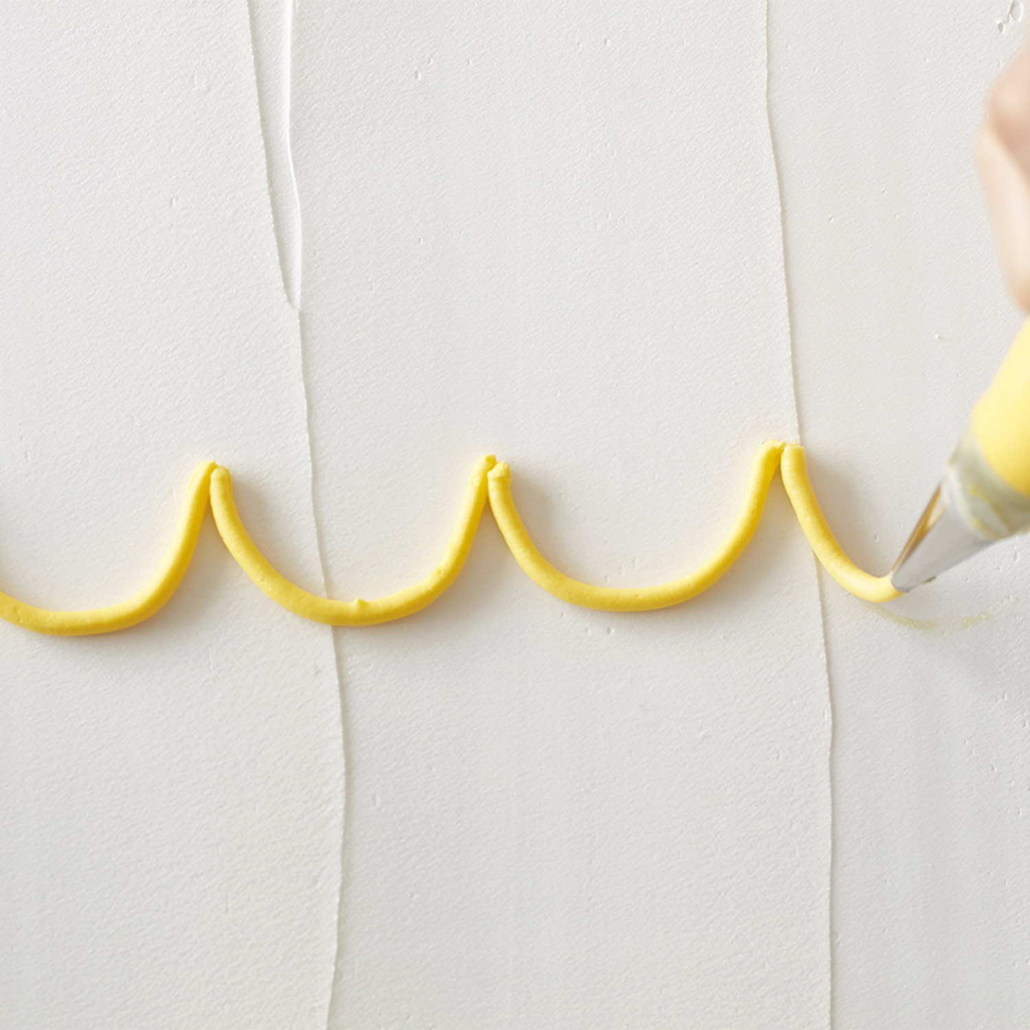 How to Pipe Drop Strings Wilton