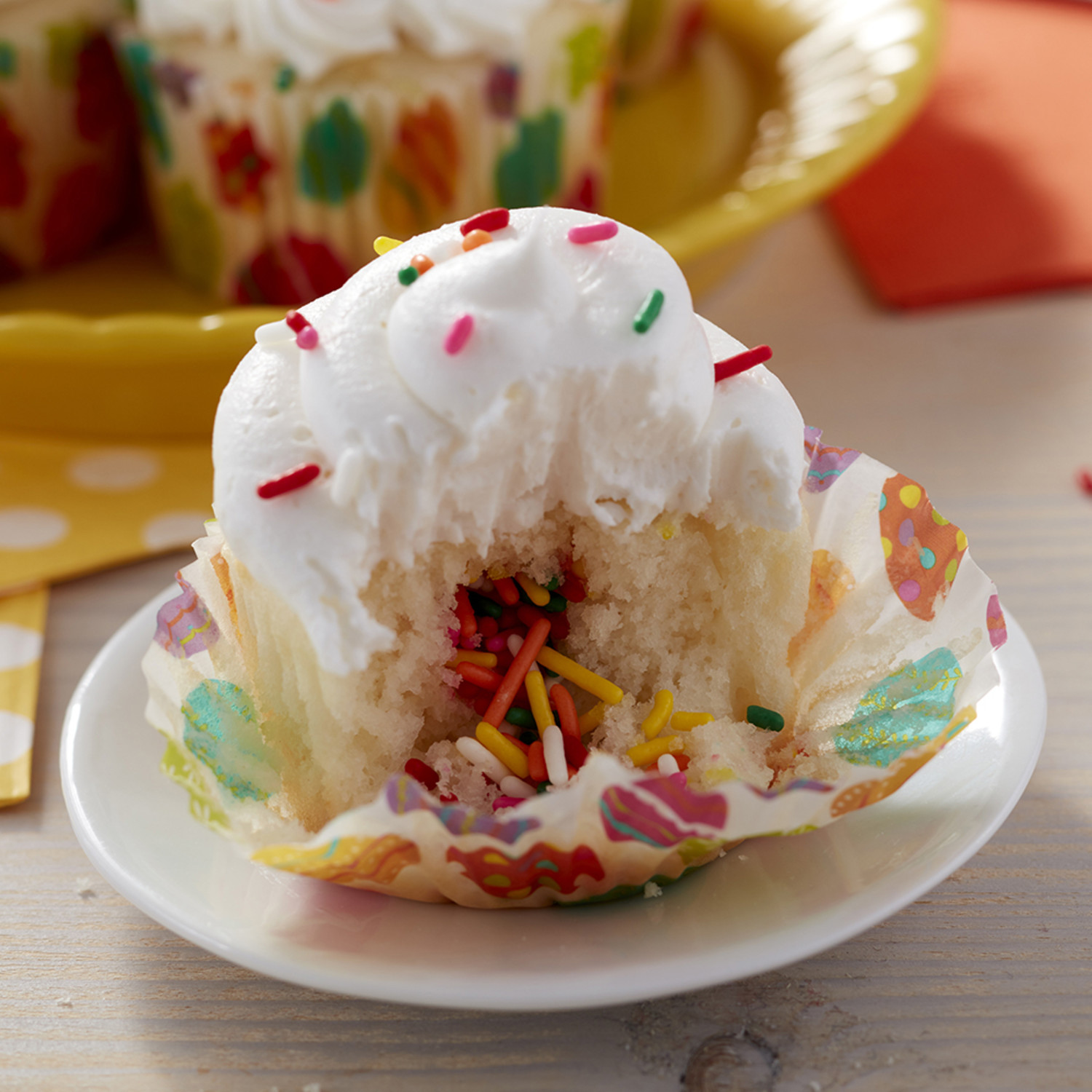 Surprise Inside Springtime Sprinkle Cupcakes