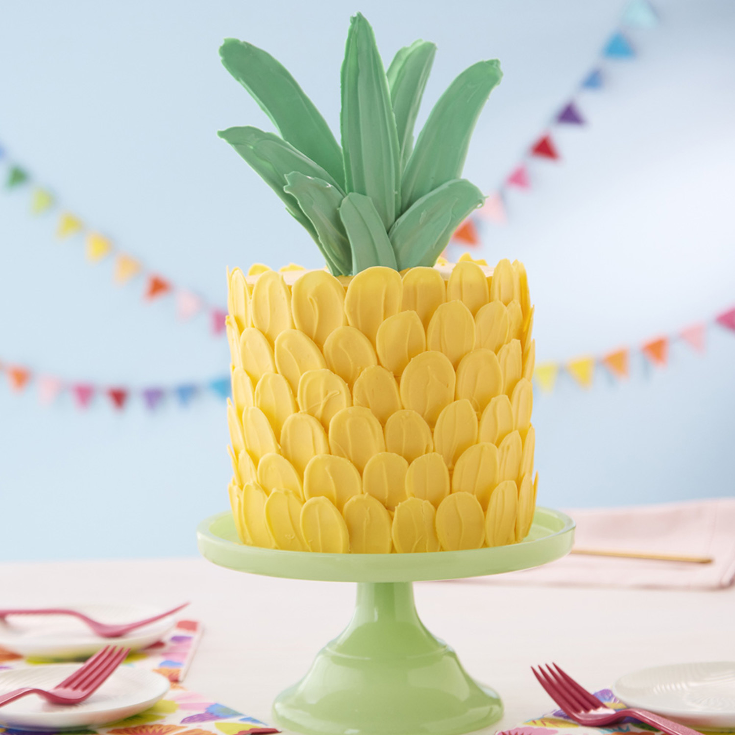 Pineapple Cupcakes with Pineapple Buttercream Frosting - Wilton