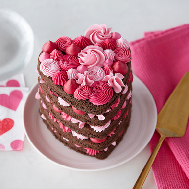 Red velvet heart cake with cream cheese frosting