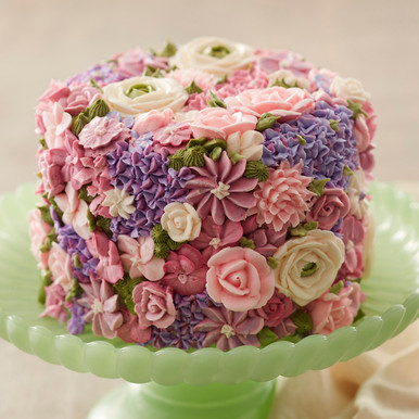 making the classic wedding. Birthday cake. White Rose. cake look with  flowers decorations White cake decorated for a wedding celebration of love,  Stock Photo | Adobe Stock