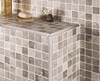 triangular tile trim for a more contemporary finish to n newly tiled areas in bathroom.