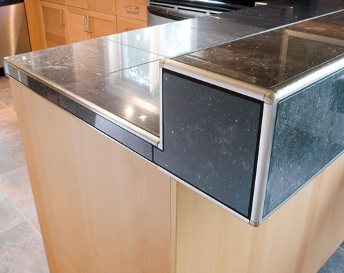 Quadrant tile trim  and corners used finish the tile edges on countertop and raised ledge Quadrant tile trim  and corners used finish the tile edges on countertop and raised ledge