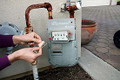 Clean the top of your Smart Meter. Then peel the backing off one Tachyon Micro-Disk and stick it in the center with "Energy flows out this side” facing the center of the Smart Meter which emits harmful EMF radiation.