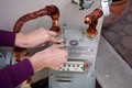 Now adhere the second Tachyon disk to the Smart Meter as shown.
Make sure you use medium pressure to assure adhesion and neutralizing effect of EMFs.