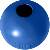 A front product photograph of a solid blue rubber KONG brand dog ball toy, isolated against a white background. The durable rubber ball features a prominent circular hole at the top for inserting treats and a debossed "KONG" logo near the bottom edge.