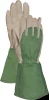 Gauntlet-style gardening gloves featuring off-white leather palms and fingers paired with long sage green canvas protective cuffs.