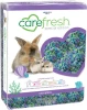 A front product photograph of a plastic-wrapped package of Carefresh Special Edition Sea Glass Small Pet Bedding, isolated against a white background. The packaging features the green Carefresh logo at the top, photos of a brown rabbit and two small hamsters next to seashell graphics on the left, and a large heart-shaped purple window on the right revealing a multi-colored teal, green, and purple paper bedding blend.