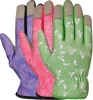 Three patterned women's gardening gloves in purple floral, pink paisley, and green leaf prints, isolated against a white background.