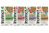 Four bags of Instinct FreshDried Meal Blends freeze-dried raw adult dog food lined up in Chicken & Supergreens, Beef & Wild Berry, Beef & Orchard Blend, and Chicken & Harvest Blend varieties, isolated on a white background.