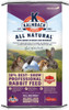 A 50 lb bag of Kalmbach Feeds 18% Best-in-Show Professional Rabbit Feed in purple and white packaging featuring photos of four rabbits sitting in grass, isolated on a white background.