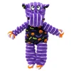 A KONG Halloween Floppy Knots Hippo dog toy in Small/Medium, crafted from purple ribbed plush with a black jack-o'-lantern printed chest and colorful knotted rope paws.