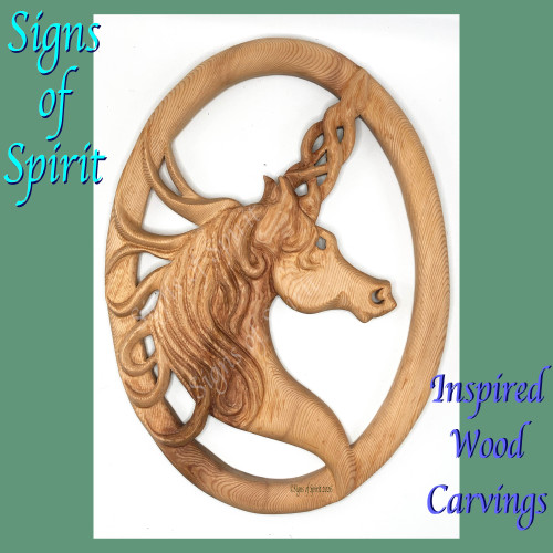Celtic Unicorn wood carving by Signs of Spirit.