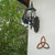 Celtic Trinity Knot displayed on the wall.  Signs of Spirit ~Inspired Wood Carvings.