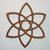 Double Trinity Wood Carving by Signs of Spirit. Coop draws this Double Trinity with compass and ruler, one Trinity knot on top of the other, inverted 180 degrees. While maintaining 2 separate knots, he then weaves the trinities together.