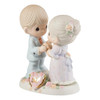 Front left angle view of the Precious Moments 'We Share a Love Forever Young' 50th Wedding Anniversary Figurine, 115912.