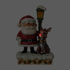 Front view of Rudolph Traditions Santa and Lampost Lighted Figurine by Jim Shore, 6009110 with simulated light-up nose.