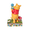 Back view of Disney Traditions Winnie the Pooh and Piglet with Easter Chicks Statue, 6010103.