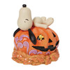 Front right view of Snoopy Laying on Carved Pumpkin Peanuts by Jim Shore Figurine, 6008966.