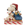 Front view of Peanuts by Jim Shore Santa Snoopy with List Figurine Statue, 6010323.