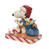 Front left angle view of Peanuts by Jim Shore Santa Snoopy with List Figurine Statue, 6010323.