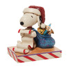Front right angle view of Peanuts by Jim Shore Santa Snoopy with List Figurine Statue, 6010323.