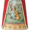 Close-up view of boy and dog scene on the Heartwood Creek Santa with Puppies Figurine by Jim Shore, 6010825.