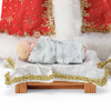 Close-up of Baby Jesus and manger from Possible Dreams Come They Told Me Santa Claus Figure Set, 6010208.