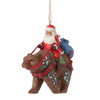 Front left side view of Heartwood Creek Santa Riding Bear Christmas Ornament by Jim Shore, 6011497.