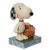 Front right angle view of the Peanuts by Jim Shore Snoopy Basket of Spring Flowers Figurine, 6011946.