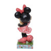 Back view of the Disney Traditions Minnie Mouse Holding Bunny Figurine by Jim Shore, 6011918.