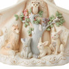 Closeup view of the animals from the Heartwood Creek White Woodland Angel with Open Coat Figurine by Jim Shore, 6012678.